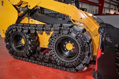 track system for skid steer|skid steer over wheel tracks.